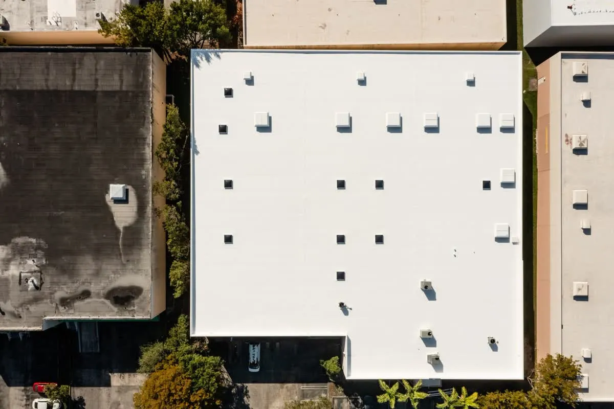 Freshly coated white flat roof seen from above